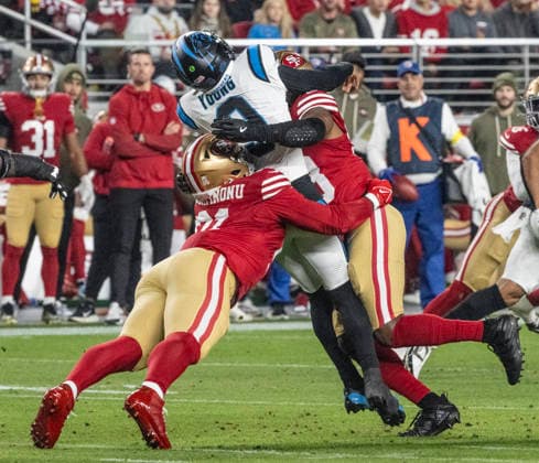 Carolina Panthers quarterback Bryce Young (9) is sandwiched by the San Francisco 49ers defense after a pass in the second quarter at Levi s Stadium in Santa Clara, California on Monday, November 24, 2025. The 49ers defeated the Panthers 20-9.  SXP2025112408 TERRYxSCHMITT