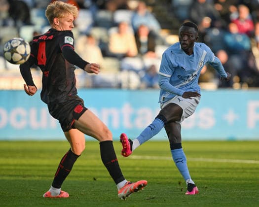 Manchester, England, 25th November 2025. Mahamadou Sangare of Manchester City shoots towards goal during the Manchester City U19 vs Bayer Leverkusen U19 UEFA Youth League match at the Academy Stadium, Manchester. Picture credit should read: Cody Froggatt Sportimage EDITORIAL USE ONLY. No use with unauthorised audio, video, data, fixture lists, club league logos or live services. Online in-match use limited to 120 images, no video emulation. No use in betting, games or single club league player publications. SPI_006_CF_MANCHESTER_CITY_U19_V_BAYER_LEVERKUSEN_U19 SPI-4326-0006