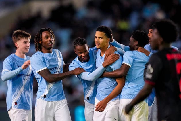 MANCHESTER, ENGLAND - NOVEMBER 25: Divine Mukasa of Manchester City U19 celebrates with his team mates after scoring his team s second goal during the UEFA Youth League 2025 26 League match between Manchester City U19 and Bayer 04 Leverkusen U19 at Joie Stadium on November 25, 2025 in Manchester, England. (Photo by Rene Nijhuis) SPO  Copyright: xRenexNijhuis