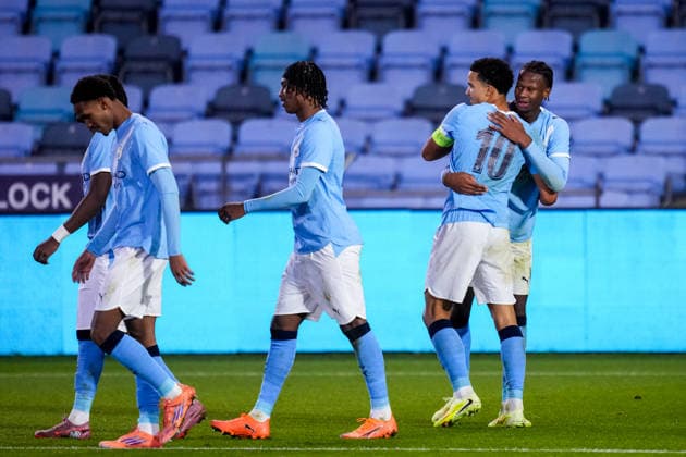 MANCHESTER, ENGLAND - NOVEMBER 25: Divine Mukasa of Manchester City U19 and Stephen Mfuni of Manchester City U19 celebrate their team s fourth goal during the UEFA Youth League 2025 26 League match between Manchester City U19 and Bayer 04 Leverkusen U19 at Joie Stadium on November 25, 2025 in Manchester, England. (Photo by Rene Nijhuis) SPO  Copyright: xRenexNijhuis