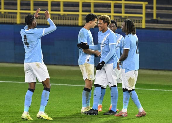 Manchester, England, 25th November 2025. Floyd Samba of Manchester City celebrates scoring his sides fifth goal during the Manchester City U19 vs Bayer Leverkusen U19 UEFA Youth League match at the Academy Stadium, Manchester. Picture credit should read: Cody Froggatt Sportimage EDITORIAL USE ONLY. No use with unauthorised audio, video, data, fixture lists, club league logos or live services. Online in-match use limited to 120 images, no video emulation. No use in betting, games or single club league player publications. SPI_015_CF_MANCHESTER_CITY_U19_V_BAYER_LEVERKUSEN_U19 SPI-4326-0015