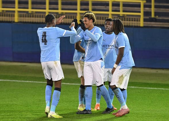 Manchester, England, 25th November 2025. Floyd Samba of Manchester City celebrates scoring his sides fifth goal during the Manchester City U19 vs Bayer Leverkusen U19 UEFA Youth League match at the Academy Stadium, Manchester. Picture credit should read: Cody Froggatt Sportimage EDITORIAL USE ONLY. No use with unauthorised audio, video, data, fixture lists, club league logos or live services. Online in-match use limited to 120 images, no video emulation. No use in betting, games or single club league player publications. SPI_016_CF_MANCHESTER_CITY_U19_V_BAYER_LEVERKUSEN_U19 SPI-4326-0016