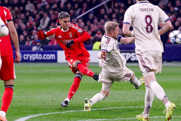 2025-11-25 AFC Ajax v SL Benfica - UEFA Champions League 2025 26 League Phase MD5 AMSTERDAM, NETHERLANDS - NOVEMBER 25: Enzo Barrenechea of SL Benfica shoots the ball during the UEFA Champions League 2025 26 League Phase MD5 match between AFC Ajax and SL Benfica at Johan Cruyff Arena on November 25, 2025 in Amsterdam, Netherlands. Amsterdam Johan Cruyff Arena Netherlands Content not available for redistribution in The Netherlands directly or indirectly through any third parties. Copyright: xBenxGalx