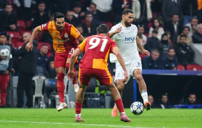 Galatasaray s Ilkay Gundogan and Union s Adem Zorgane fight for the ball during a soccer game between Turkish Galatasaray SK and Belgian Royale Union Saint-Gilloise on Tuesday 25 November 2025 in Istanbul, Turkey, on day 5 of the League phase of the UEFA Champions League tournament. VIRGINIExLEFOUR  x144214421x