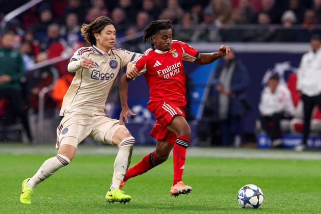 2025-11-25 AFC Ajax v SL Benfica - UEFA Champions League 2025 26 League Phase MD5 AMSTERDAM, NETHERLANDS - NOVEMBER 25: Leandro Barreiro of SL Benfica battles for possession with Ko Itakura of AFC Ajax during the UEFA Champions League 2025 26 League Phase MD5 match between AFC Ajax and SL Benfica at Johan Cruyff Arena on November 25, 2025 in Amsterdam, Netherlands. Amsterdam Johan Cruyff Arena Netherlands Content not available for redistribution in The Netherlands directly or indirectly through any third parties. Copyright: xBenxGalx