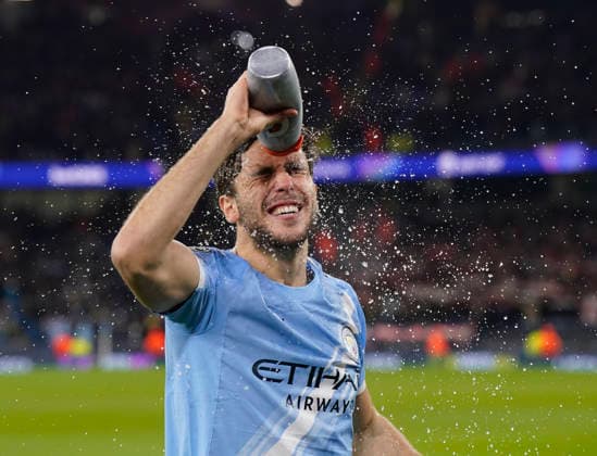 Manchester, England, 25th November 2025. Nico Gonzalez of Manchester City splashes his face with water before the Manchester City vs Bayer Leverkusen UEFA Champions League match at the Etihad Stadium, Manchester. Picture credit should read: Andrew Yates Sportimage EDITORIAL USE ONLY. No use with unauthorised audio, video, data, fixture lists, club league logos or live services. Online in-match use limited to 120 images, no video emulation. No use in betting, games or single club league player publications. SPI_017_AY_Man_City_Leverkusen SPI-4309-0028