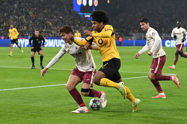 Juan Foyth FC Villarreal and Karim Adeyemi Borussia Dortmund in a duel during the UEFA Champions League 2025 26, Matchday 5 League Phase match between Borussia Dortmund and FC Villarreal, BVB Stadion on November 25, 2025 in Dortmund, Germany, Germany Photo by Ralf Treese DeFodi Images Juan Foyth FC Villarreal and Karim Adeyemi Borussia Dortmund battle for the ball during the UEFA Champions League 2025 26 League Phase MD5 match between Borussia Dortmund and Villarreal CF at BVB Stadion Dortmund on November 25, 2025 in Dortmund, Germany Photo by Ralf Treese DeFodi Images