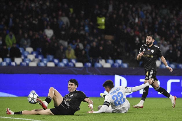 Napoli v Qarabag - UEFA Champions League NAPOLI, ITALY - NOVEMBER 25: Giovanni Di Lorenzo (C), of Napoli, is challenged by Bahlul Mustafazade (L) and Elvin Jafarguliyev (R), of Qarabag, (R) during the League phase UEFA Champions League football match between Napoli and Qarabag at the Diego Armando Maradona stadium in Naples, Italy, on November 25, 2025. Isabella Bonotto Anadolu Napoli Italy. Editorial use only. Please get in touch for any other usage.  Copyright: x2025xAnadoluxIsabellaxBonottox
