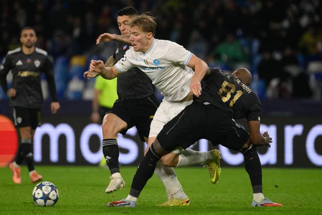 Pedro Bicalho of Qarabag, Rasmus Hojlund of SSC Napoli and Kevin Medina of Qarabag compete for the ball during the UEFA Champions League 2025 2026 football match between SSC Napoli and Qarabag FK at Diego Armando Maradona stadium in Naples (Italy), November 25, 2025. AndreaxStaccioli