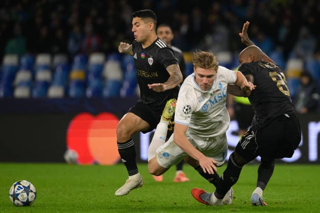 Pedro Bicalho of Qarabag, Rasmus Hojlund of SSC Napoli and Kevin Medina of Qarabag compete for the ball during the UEFA Champions League 2025 2026 football match between SSC Napoli and Qarabag FK at Diego Armando Maradona stadium in Naples (Italy), November 25, 2025. AndreaxStaccioli