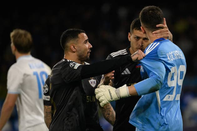 Mateusz Kochalski of Qarabag celebrates with team mates after saving a penalty during the UEFA Champions League 2025 2026 football match between SSC Napoli and Qarabag FK at Diego Armando Maradona stadium in Naples (Italy), November 25, 2025. AndreaxStaccioli