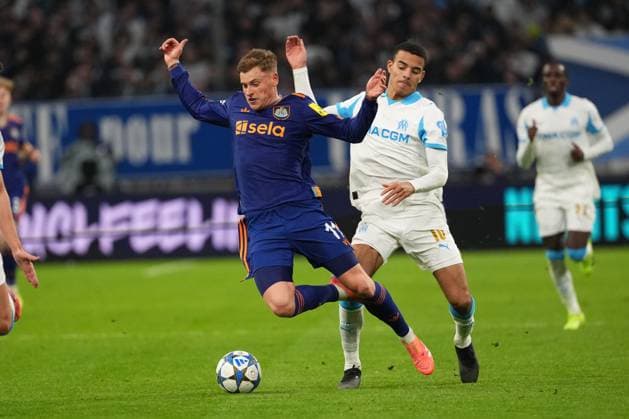 Mason Greenwood of Marseille gets a yellow card for a foul on Harvey Barnes of Newcastle Marseille v Newcastle United, UEFA Champions League, Group Stage, Football, Orange Velodrome, Marseille, France- 25 Nov 2025Marseille Orange Vélodrome France EDITORIAL USE ONLY No use with unauthorised audio, video, data, fixture lists, club league logos or live services. Online in-match use limited to 120 images, no video emulation. No use in betting, games or single club league player publications.  Copyright: xDavexWinter Shutterstockx 15918266cr