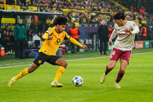 2025-11-25 Borussia Dortmund v Villarreal CF - UEFA Champions League 2025 26 League Phase MD5 DORTMUND, GERMANY - NOVEMBER 25: Sergi Cardona of Villarreal CF defends Karim Adeyemi of Borussia Dortmund during the UEFA Champions League 2025 26 League Phase MD5 match between Borussia Dortmund and Villarreal CF at BVB Stadion Dortmund on November 25, 2025 in Dortmund, Germany. (Photo by Gabriel Calvino Alonso BSR Agency) Dortmund Germany Content not available for redistribution in The Netherlands directly or indirectly through any third parties. Copyright: xBSRxAgencyx