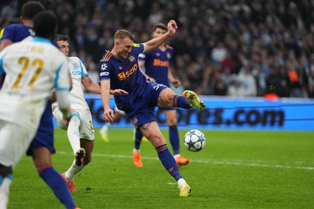 Dan Burn of Newcastle fires in a shot Marseille v Newcastle United, UEFA Champions League, Group Stage, Football, Orange Velodrome, Marseille, France- 25 Nov 2025Marseille Orange Vélodrome France EDITORIAL USE ONLY No use with unauthorised audio, video, data, fixture lists, club league logos or live services. Online in-match use limited to 120 images, no video emulation. No use in betting, games or single club league player publications.  Copyright: xDavexWinter Shutterstockx 15918266cz