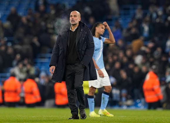 Manchester, England, 25th November 2025. Dejected Pep Guardiola coach of Manchester City during the Manchester City vs Bayer Leverkusen UEFA Champions League match at the Etihad Stadium, Manchester. Picture credit should read: Andrew Yates Sportimage EDITORIAL USE ONLY. No use with unauthorised audio, video, data, fixture lists, club league logos or live services. Online in-match use limited to 120 images, no video emulation. No use in betting, games or single club league player publications. SPI_076_AY_Man_City_Leverkusen SPI-4309-0112