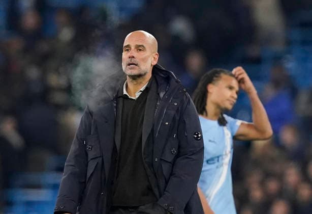 Manchester, England, 25th November 2025. Dejected Pep Guardiola coach of Manchester City during the Manchester City vs Bayer Leverkusen UEFA Champions League match at the Etihad Stadium, Manchester. Picture credit should read: Andrew Yates Sportimage EDITORIAL USE ONLY. No use with unauthorised audio, video, data, fixture lists, club league logos or live services. Online in-match use limited to 120 images, no video emulation. No use in betting, games or single club league player publications. SPI_080_AY_Man_City_Leverkusen SPI-4309-0116
