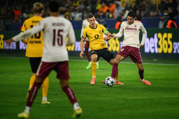 DORTMUND, GERMANY - 25 NOVEMBER, 2025: Nico Schlotterbeck, Santiago Comesana - UEFA Champions League match Borussia Dortmund vs Villarreal CF at Signal Iduna Park.  Copyright: xVITALIIxKLIUIEVx