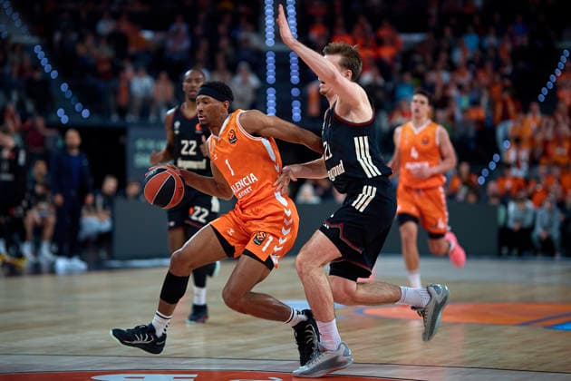 (251126) -- VALENCIA, Nov. 26, 2025 -- Kameron Taylor (L) of Valencia Basket disputes the ball with Jutsus Hollatz of FC Bayern Munich during a Euroleague basketball match between Valencia Basket and FC Bayern Munich in Valencia, Spain, Nov. 25, 2025. (Photo by Xinhua) (SP)SPAIN-VALENCIA-BASKETBALL-EUROLEAGUE-VALENCIA VS MUNICH PabloxMorano 