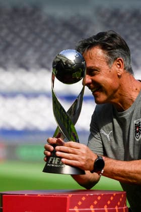 SOCCER - 2025 FIFA U17, U 17 World Cup DOHA,QATAR,26.NOV.25 - SOCCER - FIFA Under 17 World Cup Qatar 2025, preview, pitch familiarization, final, Portugal vs Austria. Image shows head coach Hermann Stadler (AUT). Keywords: trophy.  GEPAxpictures xRanjithxKumar