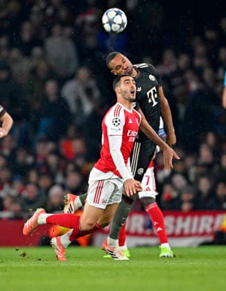 26 11 2025, Football UEFA Champions League 2025 2026 Preliminary Round 5 Matchday, FC Arsenal FC Bayern Munich, at Emirates Stadium London England Jonathan Tah FC Bayern Munich prevails DFL and DFB regulations prohibit any use of photographs as image sequences and or quasi video