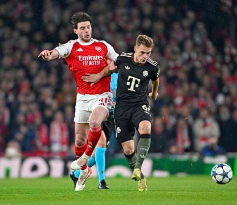 26 11 2025, Football UEFA Championsleague 2025 2026 Preliminary Round 5 Matchday, FC Arsenal FC Bayern Munich, at Emirates Stadium London England v l Declan Rice FC Arsenal v Joshua Kimmich FC Bayern Munich DFL and DFB regulations prohibit any use of photographs as image sequences and or quasi video