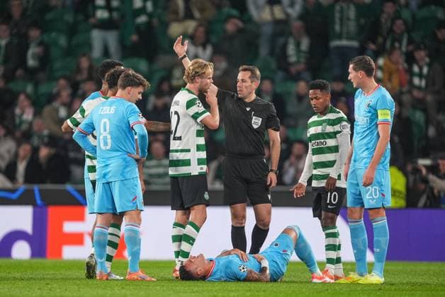 Sporting s Morten Hjulmand receives a red card from the referee during a soccer game between Portuguese Sporting Clube de Portugal and Belgian Club Brugge KV, on Wednesday 26 November 2025 in Lisboa, Portugal, on day five of the League phase of the UEFA Champions League tournament. JOMAxGARCIAxIxGISBERT  x144489996x