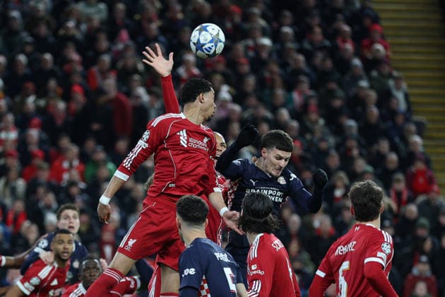 Liverpool, England, 26th November 2025. Virgil van Dijk of Liverpool concedes a penalty for handball during the Liverpool vs PSV Eindhoven UEFA Champions League match at Anfield, Liverpool. Picture credit should read: James Baylis Sportimage EDITORIAL USE ONLY. No use with unauthorised audio, video, data, fixture lists, club league logos or live services. Online in-match use limited to 120 images, no video emulation. No use in betting, games or single club league player publications. SPI_023_JB_Liverpool_PSV SPI-4311-0023