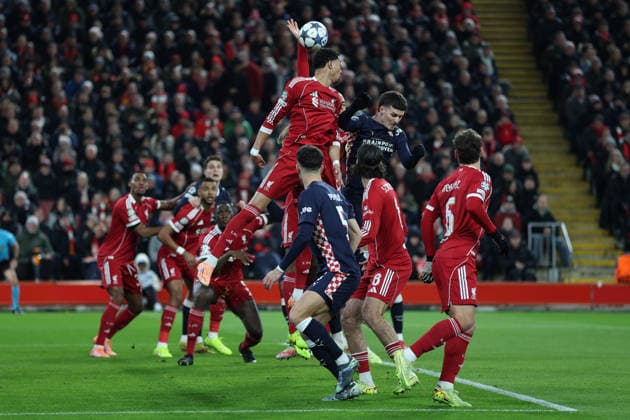 Liverpool, England, 26th November 2025. Virgil van Dijk of Liverpool concedes a penalty for handball during the Liverpool vs PSV Eindhoven UEFA Champions League match at Anfield, Liverpool. Picture credit should read: James Baylis Sportimage EDITORIAL USE ONLY. No use with unauthorised audio, video, data, fixture lists, club league logos or live services. Online in-match use limited to 120 images, no video emulation. No use in betting, games or single club league player publications. SPI_024_JB_Liverpool_PSV SPI-4311-0024