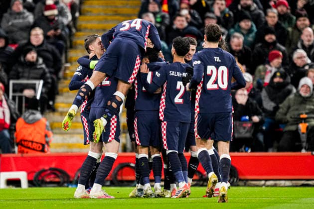 LIVERPOOL, ENGLAND - NOVEMBER 26: Ivan Perisic of PSV celebrates with Joey Veerman of PSV, Jerdy Schouten of PSV, Dennis Man of PSV and Ismael Saibari of PSV after scoring his teams first goal during the UEFA Champions League 2025 26 League Phase MD5 match between Liverpool FC and PSV Eindhoven at Anfield on November 26, 2025 in Liverpool, England. (Photo by Rene Nijhuis) SPO  Copyright: xRenexNijhuis