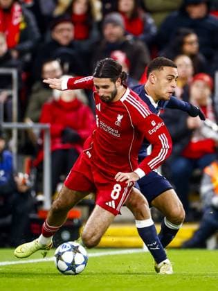 LIVERPOOL - (l-r) Dominik Szoboszlai of Liverpool FC, Sergino Dest of PSV Eindhoven during the Champions League match between Liverpool FC and PSV Eindhoven at Anfield Stadium on November 26, 2025, in Liverpool, United Kingdom. ANP SEM VAN DER WAL UEFA Champions League Matchday 5 2025-2026 xVIxANPxSportx xxANPxIVx 543149361 originalFilename: 543149361.jpg