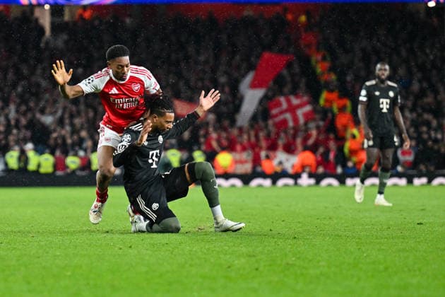 UEFA Champions League Arsenal FC FC Bayern Munich 26 11 2025 LONDON, ENGLAND 26 NOVEMBER in the clash between Myles LEWIS SKELLY Arsenal FC 49 and Michael OLISE FC Bayern Munich 17 in the league match between Arsenal London and FC Bayern Munich on UEFA Champions League matchday 5 at Emirates Stadium on 26 11 2025 Copyright: xBEAUTIFULxSPORTS Goldbergx
