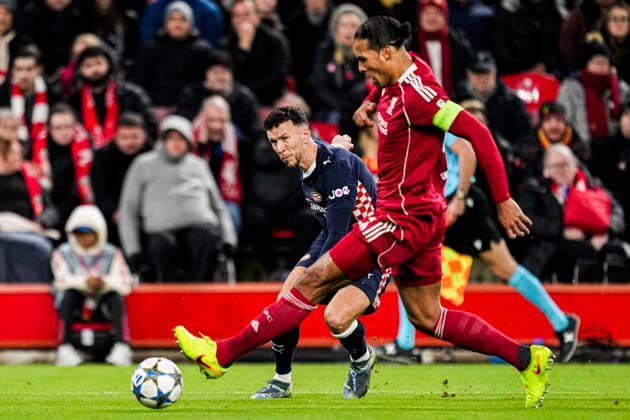 LIVERPOOL, ENGLAND - NOVEMBER 26: Ivan Perisic of PSV battles for possession with Virgil van Dijk of Liverpool during the UEFA Champions League 2025 26 League Phase MD5 match between Liverpool FC and PSV Eindhoven at Anfield on November 26, 2025 in Liverpool, England. (Photo by Rene Nijhuis) SPO  Copyright: xRenexNijhuis