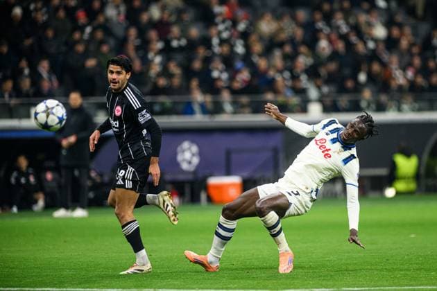 FRANKFURT, GERMANY - 26 NOVEMBER, 2025: Odilon Kossounou, Mahmoud Dahoud - UEFA Champions League match Eintracht Frankfurt vs Atalanta Bergamo at Deutsche Bank Park.  Copyright: xVITALIIxKLIUIEVx