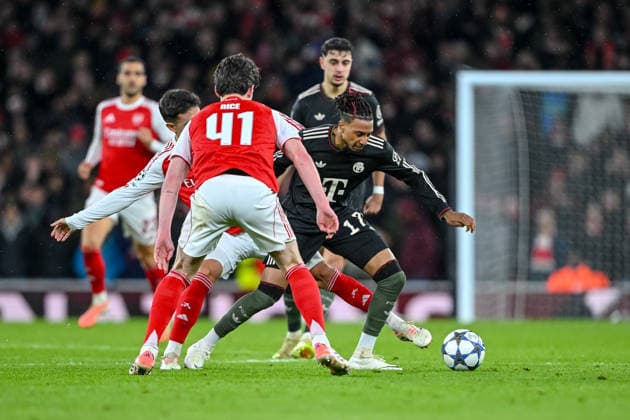 Declan Rice Arsenal FC and Michael Olise Bayern Muenchen battle for the ball during the UEFA Champions League 2025 26 League Phase MD5 match between Arsenal FC and FC Bayern München at Arsenal Stadium on November 26, 2025 in London, United Kingdom Photo by Harry Langer DeFodi Images
