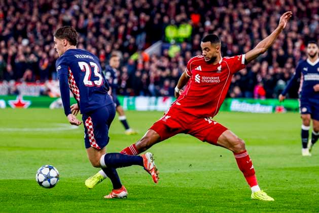 Joey Veerman of PSV Eindhoven and Cody Gakpo of Liverpool FC battle for the ball Liverpool FC v PSV Eindhoven, UEFA Champions League 2025 26 League Phase MD5, Liverpool FC v PSV Eindhoven, Anfield, November 26, 2025, Liverpool, United Kingdom.