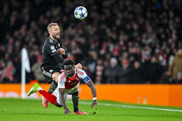 Konrad Laimer Bayern Muenchen and Bukayo Saka Arsenal FC battle for the ball during the UEFA Champions League 2025 26 League Phase MD5 match between Arsenal FC and FC Bayern München at Arsenal Stadium on November 26, 2025 in London, United Kingdom Photo by Harry Langer DeFodi Images