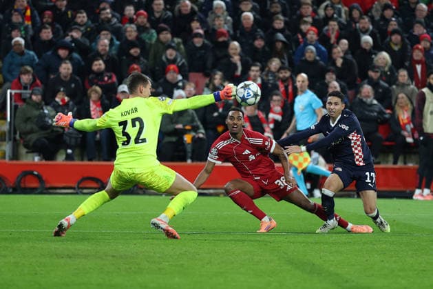 Liverpool, England, 26th November 2025. Ryan Gravenberch of Liverpool has his shot saved by Matej Kovar of PSV Eindhoven during the Liverpool vs PSV Eindhoven UEFA Champions League match at Anfield, Liverpool. Picture credit should read: James Baylis Sportimage EDITORIAL USE ONLY. No use with unauthorised audio, video, data, fixture lists, club league logos or live services. Online in-match use limited to 120 images, no video emulation. No use in betting, games or single club league player publications. SPI_067_JB_Liverpool_PSV SPI-4311-0067