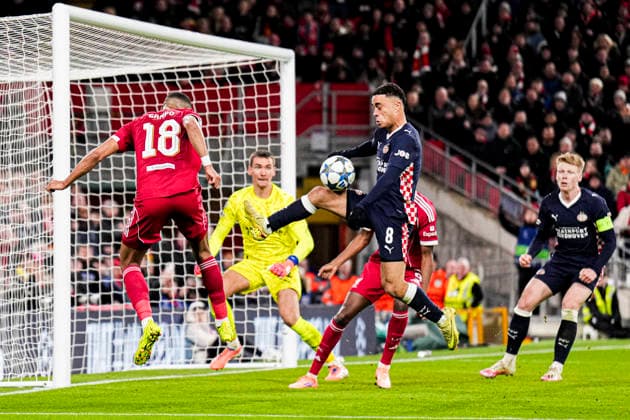 LIVERPOOL, ENGLAND - NOVEMBER 26: Cody Gakpo of Liverpool heads the ball with Sergino Dest of PSV during the UEFA Champions League 2025 26 League Phase MD5 match between Liverpool FC and PSV Eindhoven at Anfield on November 26, 2025 in Liverpool, England. (Photo by Rene Nijhuis) SPO  Copyright: xRenexNijhuis