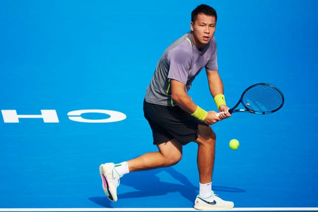 CHENGDU, CHINA - NOVEMBER 25: Yang Zijiang of China returns a shot in the Men s Singles first round match against Bu Yunchaokete of China on day 2 of 2026 Australian Open Asia-Pacific Wildcard Playoffs at the Sichuan International Tennis Centre on November 25, 2025 in Chengdu, Sichuan Province of China.  Copyright: xVCGx 111606016905