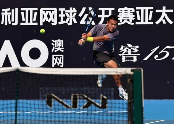 CHENGDU, CHINA - NOVEMBER 25: Yang Zijiang of China returns a shot in the Men s Singles first round match against Bu Yunchaokete of China on day 2 of 2026 Australian Open Asia-Pacific Wildcard Playoffs at the Sichuan International Tennis Centre on November 25, 2025 in Chengdu, Sichuan Province of China.  Copyright: xChinaxNewsxServicex 111605920951