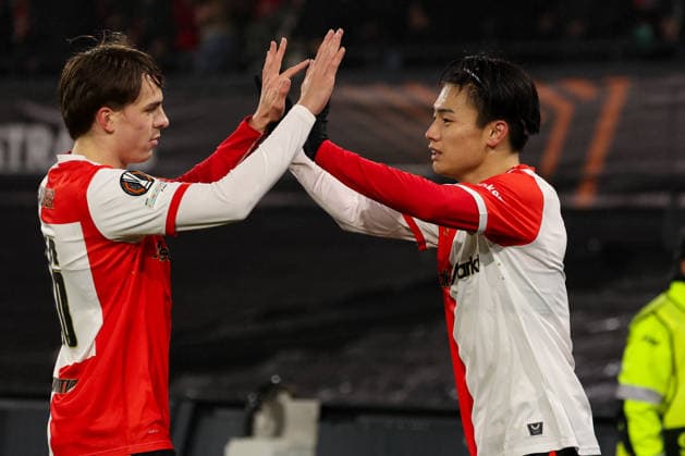 2025-11-27 Feyenoord v Celtic FC - UEFA Europa League, League phase, MD5 ROTTERDAM, NETHERLANDS - NOVEMBER 27: Leo Sauer of Feyenoord, Ayase Ueda of Feyenoord celebrates after scoring the first goal of the team during the UEFA Europa League, League phase, MD5 match between Feyenoord and Celtic FC at Stadion Feijenoord on November 27, 2025 in Rotterdam, Netherlands. Rotterdam Stadion Feijenoord Netherlands Content not available for redistribution in The Netherlands directly or indirectly through any third parties. Copyright: xHansxvanxderxValkx