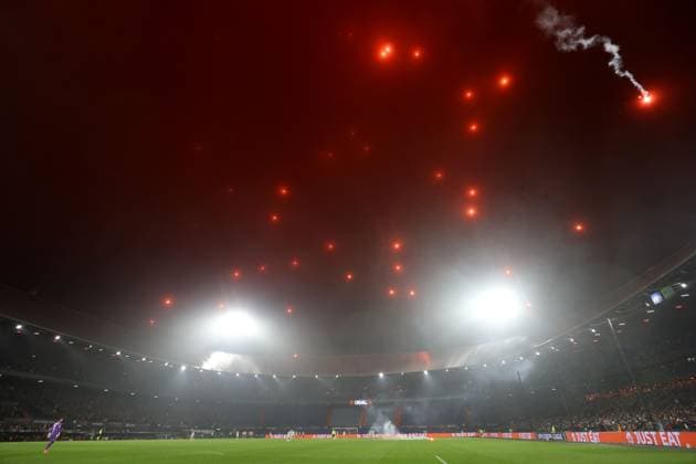 Fireworks land on the pitch after the opening goal from Feyenoord Feyenoord v Celtic, UEFA Europa League, Group Stage, Football, Stadion Feijenoord, Rotterdam, Netherlands - 27 Nov 2025Rotterdam Stadion Feijenoord Netherlands EDITORIAL USE ONLY No use with unauthorised audio, video, data, fixture lists, club league logos or live services. Online in-match use limited to 120 images, no video emulation. No use in betting, games or single club league player publications.  Copyright: xKieranxMcManus Shutterstockx 15928065aj
