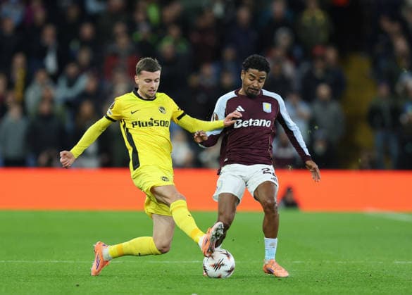 Birmingham, England, 27th November 2025. Darian Males of Young Boys (l) and Ian Maatsen of Aston Villa (r) during the Aston Villa vs Young Boys UEFA Europa League match at Villa Park, Birmingham. Picture credit should read: James Baylis Sportimage EDITORIAL USE ONLY. No use with unauthorised audio, video, data, fixture lists, club league logos or live services. Online in-match use limited to 120 images, no video emulation. No use in betting, games or single club league player publications. SPI_011_JB_Villa_YoungBoys SPI-4329-0011
