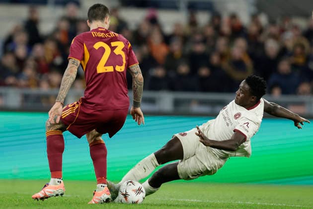 UEFA Europa League AS Roma vs Football Club Midtjylland Midtjylland s Bissau-Guinean forward Franculino Dju challenges for the ball with Roma™s Italian defender Gianluca Mancini during UEFA Europa League first round day 5 football match AS Roma vs Football Club Midtjylland at the Olimpic Stadium in Rome, on November 27, 2025. _BPH3456 Copyright: xAntonioxBalascox