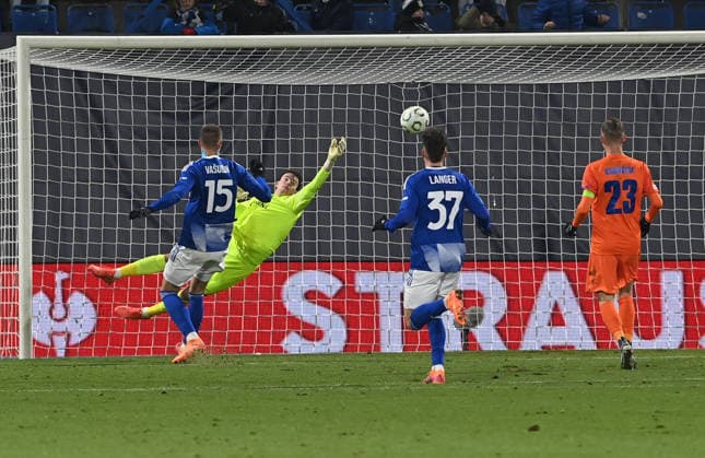 L-R Daniel Vasulin (Olomouc), goalkeeper Zan-Luk Lebane (Celje), Stepan Langer (Olomouc) and Zan Karnicnik (Celje) in action during the Football UEFA Conference League, 4th round match: Sigma Olomouc vs NK Celje in Olomouc, Czech Republic, November 27, 2025. (CTKxPhoto LudekxPerina) CTKPhotoP2025112707367  CTKPhotoP2025112707367