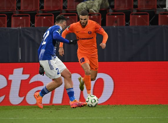 L-R Matej Hadas (Olomouc) and Danijel Sturm (Celje) in action during the Football UEFA Conference League, 4th round match: Sigma Olomouc vs NK Celje in Olomouc, Czech Republic, November 27, 2025. (CTKxPhoto LudekxPerina) CTKPhotoP2025112707387  CTKPhotoP2025112707387