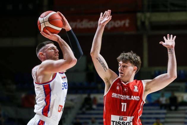 Serbia v Switzerland - FIBA World Cup European Qualifiers BELGRADE, SERBIA - NOVEMBER 27: Stefan Momirov (9) of Serbia in action against Yuri Solca (11) of Switzerland during the FIBA World Cup European Qualifiers group C first round basketball match between Serbia and Switzerland at Aleksandar Nikolic Hall in Belgrade, Serbia on November 27, 2025. Filip Stevanovic Anadolu Belgrade Serbia. Editorial use only. Please get in touch for any other usage.  Copyright: x2025xAnadoluxFilipxStevanovicx