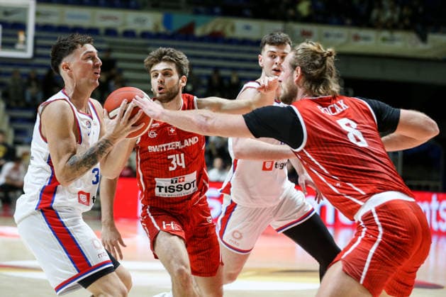 Serbia v Switzerland - FIBA World Cup European Qualifiers BELGRADE, SERBIA - NOVEMBER 27: Danilo Andusic (33) of Serbia in action against Matteo Picarelli (34), and Toni Rocak (8) of Switzerland during the FIBA World Cup European Qualifiers group C first round basketball match between Serbia and Switzerland at Aleksandar Nikolic Hall in Belgrade, Serbia on November 27, 2025. Filip Stevanovic Anadolu Belgrade Serbia. Editorial use only. Please get in touch for any other usage.  Copyright: x2025xAnadoluxFilipxStevanovicx