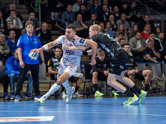 Handball, Men, Season 2025 2026, Champions League Group A, Matchday 9 , Füchse Berlin One Veszprem HC, v l Yehia Mohammed Yehia Elderaa Veszprem , Matthes Langhoff Füchse Berlin , 27 11 2025, Copyright: xSebastianxRäppold MatthiasxKochx