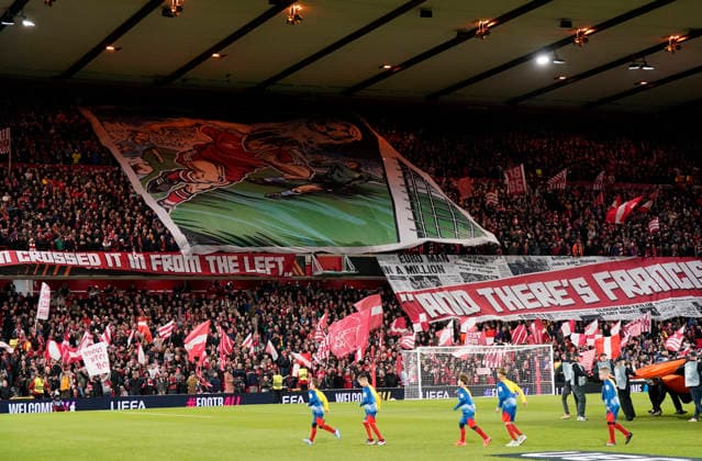 Nottingham, England, 27th November 2025. Giant Tifo displayed by the fans as the teams emerge during the Nottingham Forest vs Malmo UEFA Europa League match at the City Ground, Nottingham. Picture credit should read: Andrew Yates Sportimage EDITORIAL USE ONLY. No use with unauthorised audio, video, data, fixture lists, club league logos or live services. Online in-match use limited to 120 images, no video emulation. No use in betting, games or single club league player publications. SPI_017_AY_Forest_Malmo SPI-4328-0026